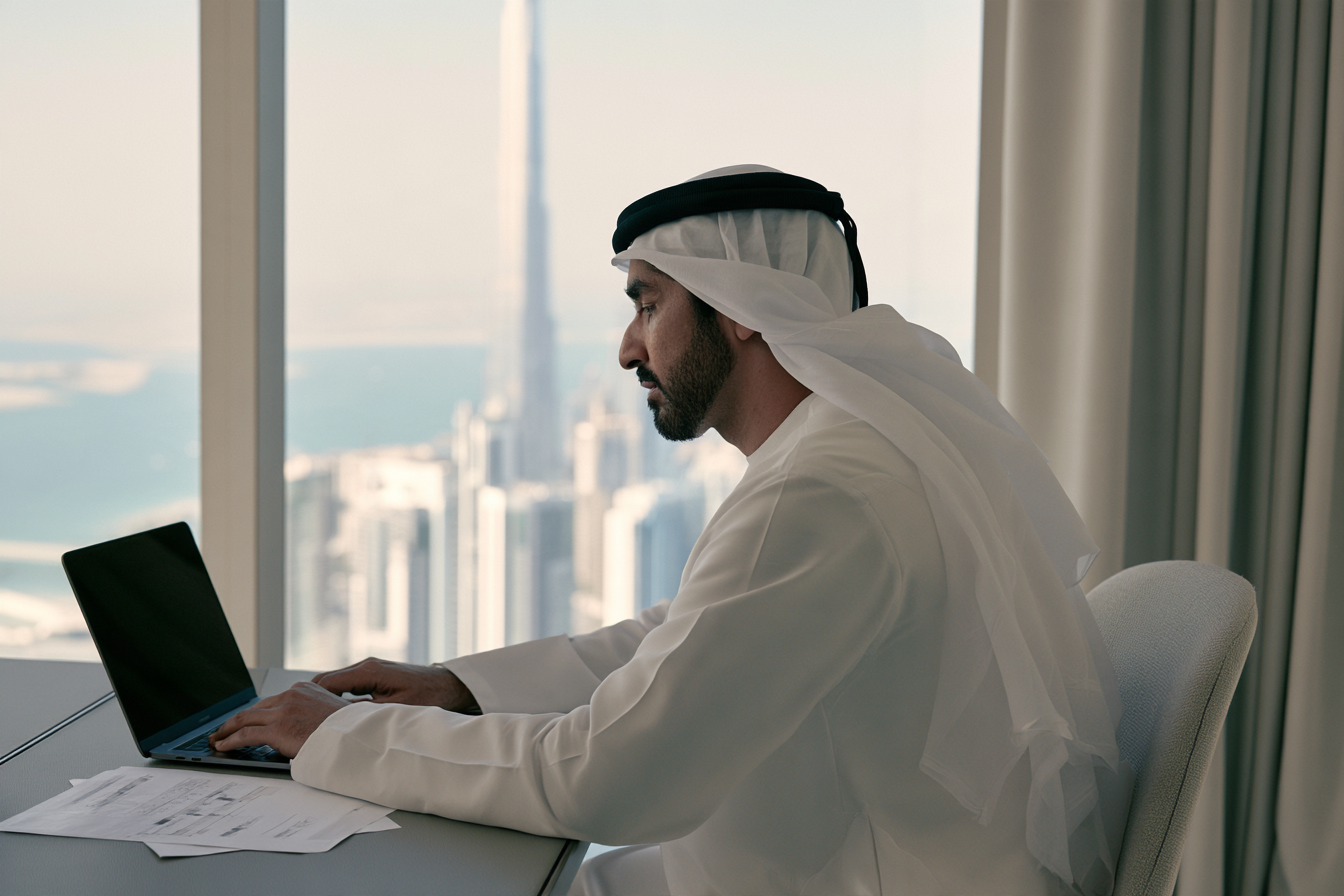 Independent founder reviewing a company plan in a UAE workspace